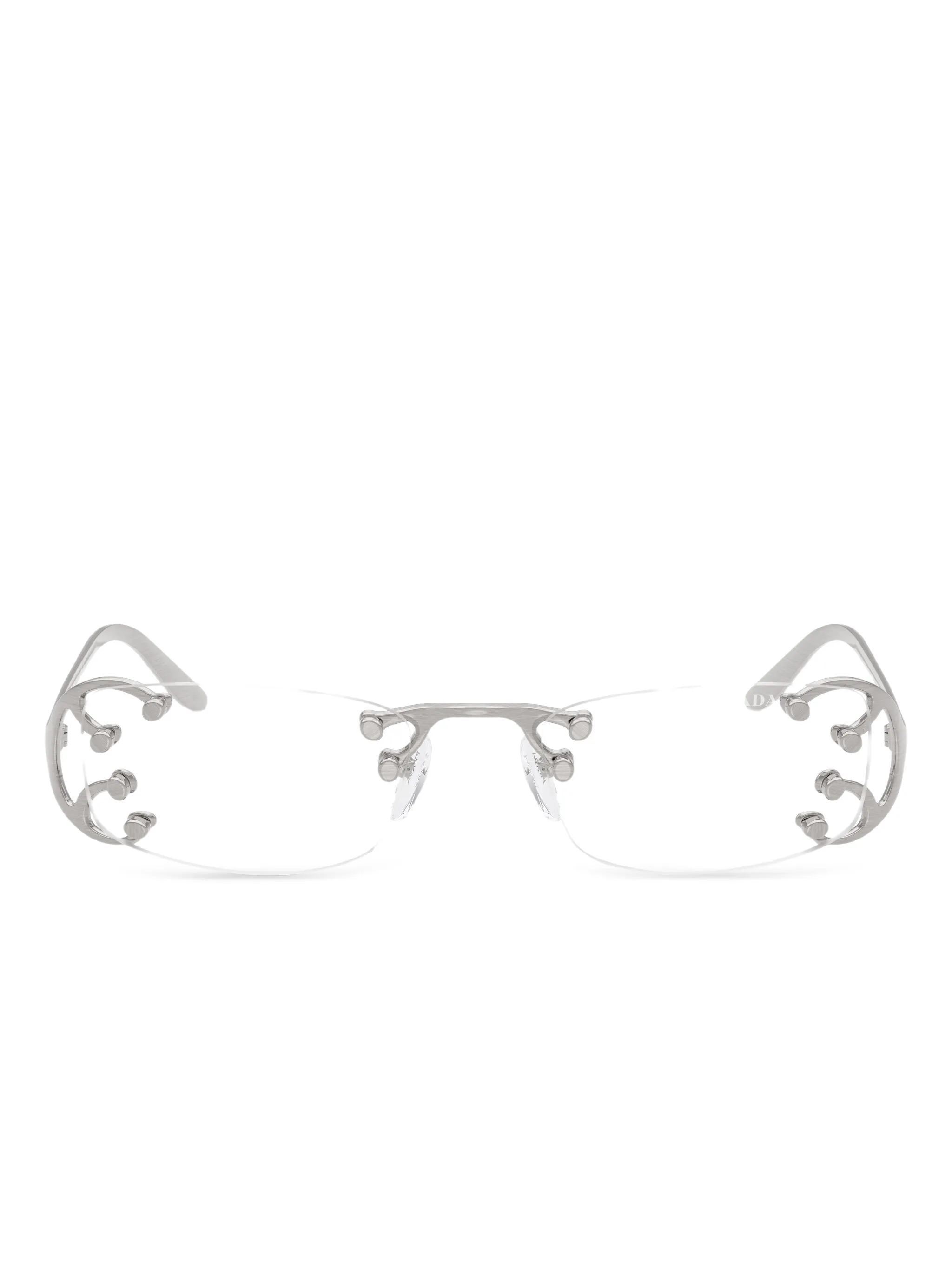 Rimless metallic detail close‑up